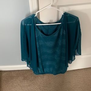 Teal/Dark Green stretchy blouse with silver accents and sheer flouncy sleeves.